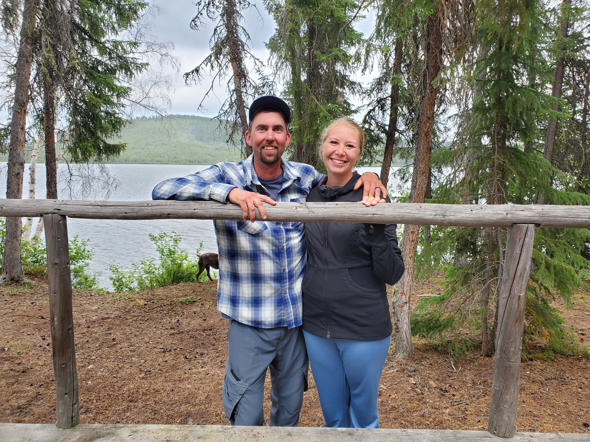 Dan and Morgan Brelje at the shoreline rail at Plaisted Camps, Russell Lake